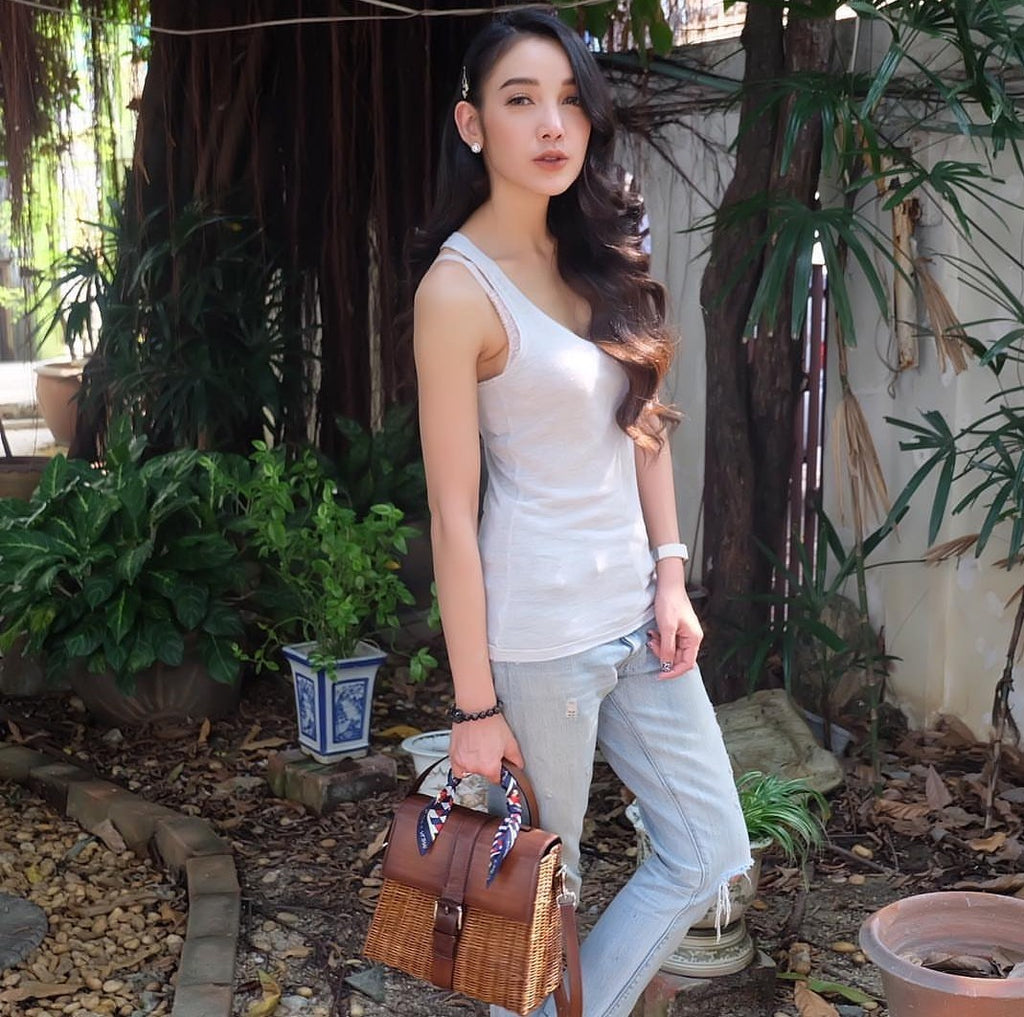 Pat looks gorgeous in casual outfit carrying LENA wicker bag
